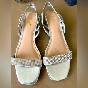 Aldo sandals . Low heel color silver . Size 8